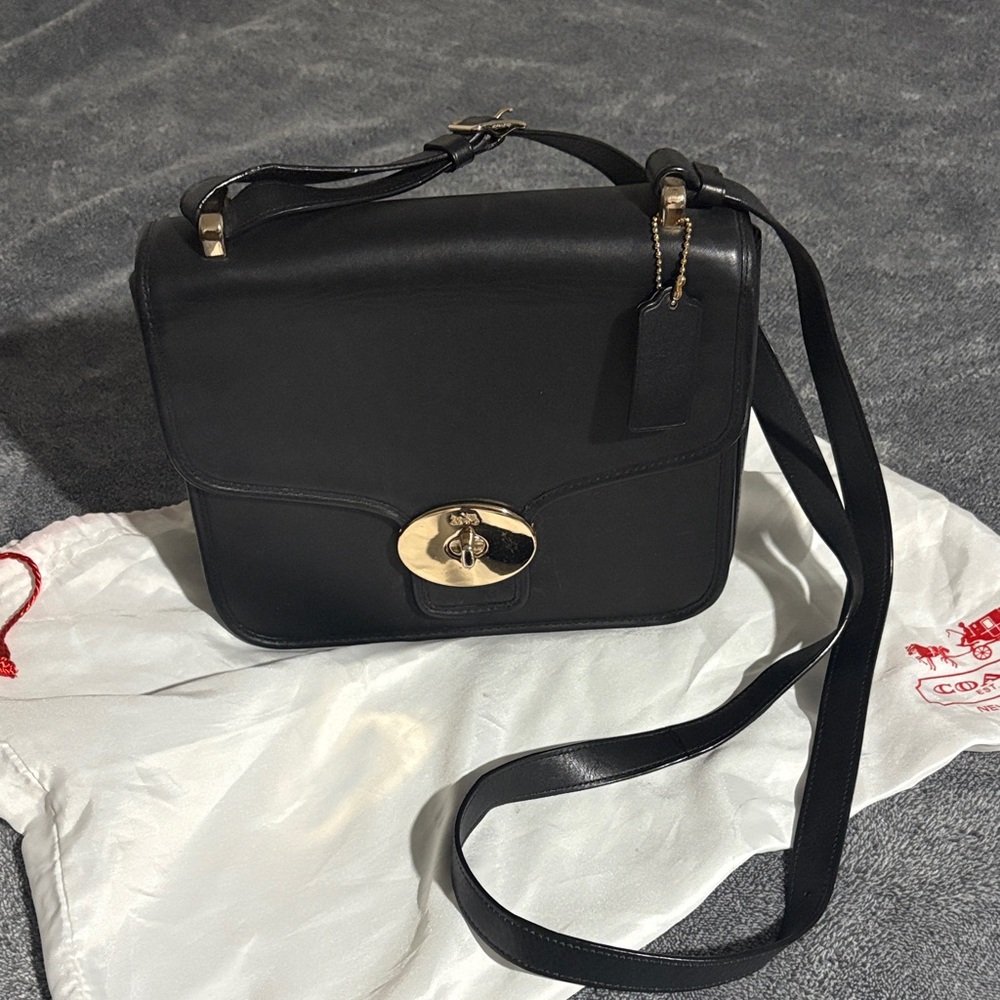 Coach Elegant Black Crossbody Bag with Gold Details